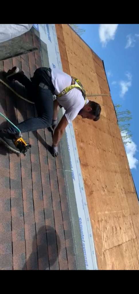 RH Professionals Repairing Gutters