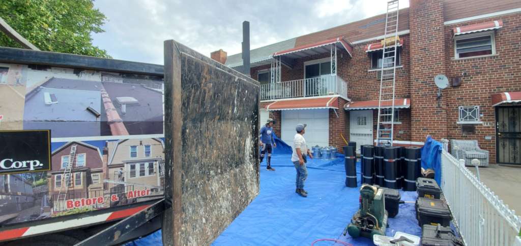Flat Roof Installation, New Skylight, New Gutters and New Shingle Project Shot 4