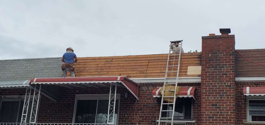 Flat Roof Installation, New Skylight, New Gutters and New Shingle Project Shot 6