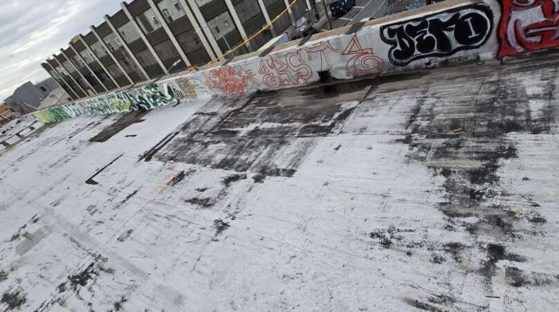 New Rubber Layer on Commercial Flat Roof Installation in Queens Project Shot 1