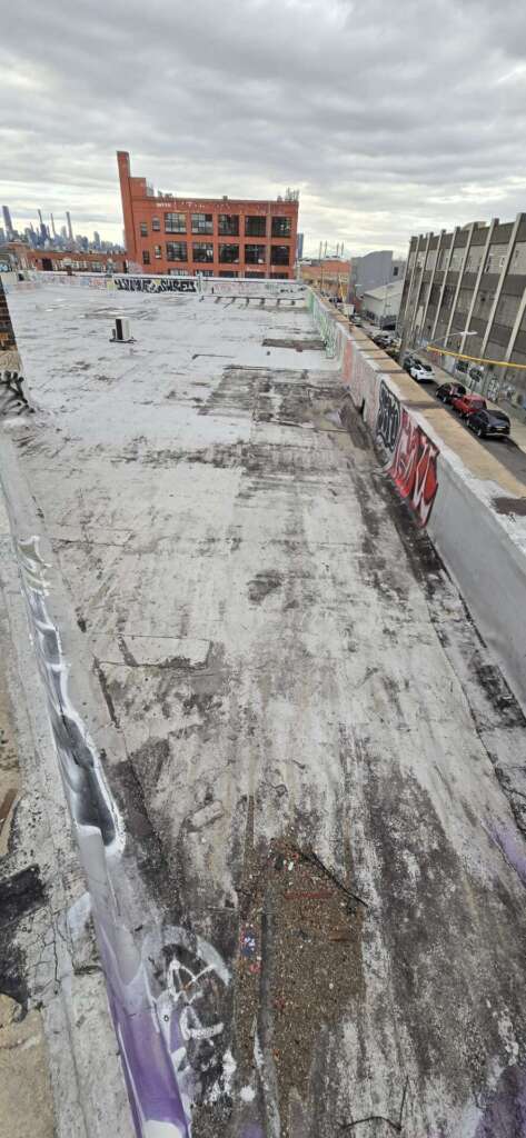 New Rubber Layer on Commercial Flat Roof Installation in Queens Project Shot 2