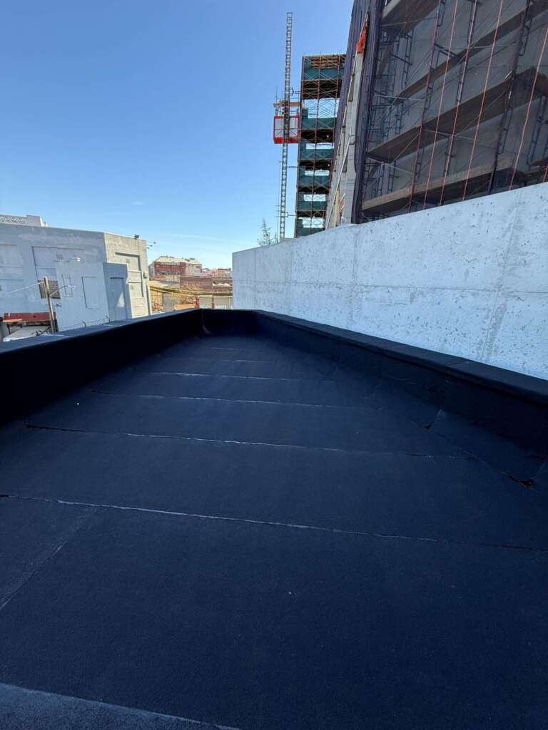 New Rubber Layer on Commercial Flat Roof Installation in Queens Project Shot 5