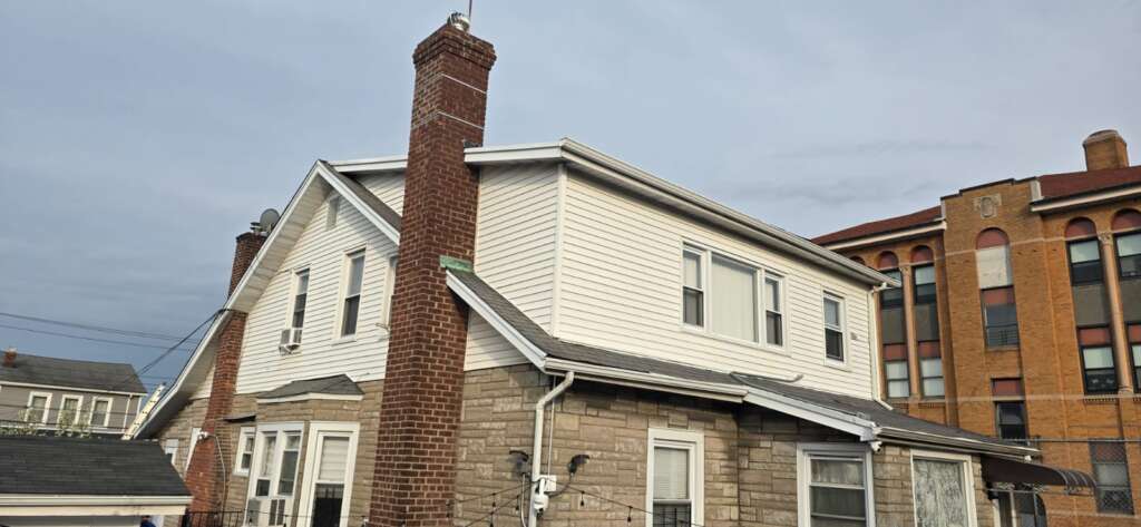 New Shingle Roof, Gutter, Siding and Soffit Installation in Bronx Project Shot 4
