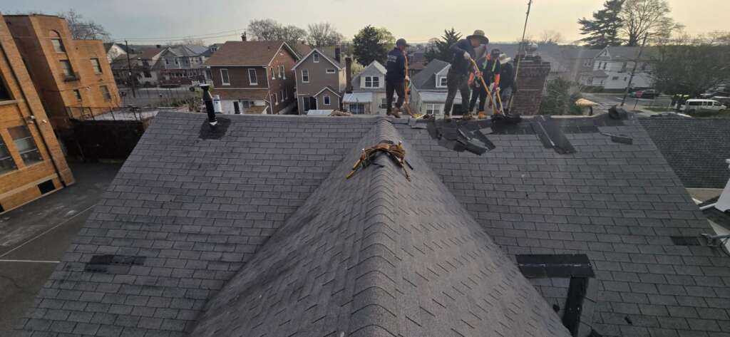 New Shingle Roof, Gutter, Siding and Soffit Installation in Bronx Project Shot 5