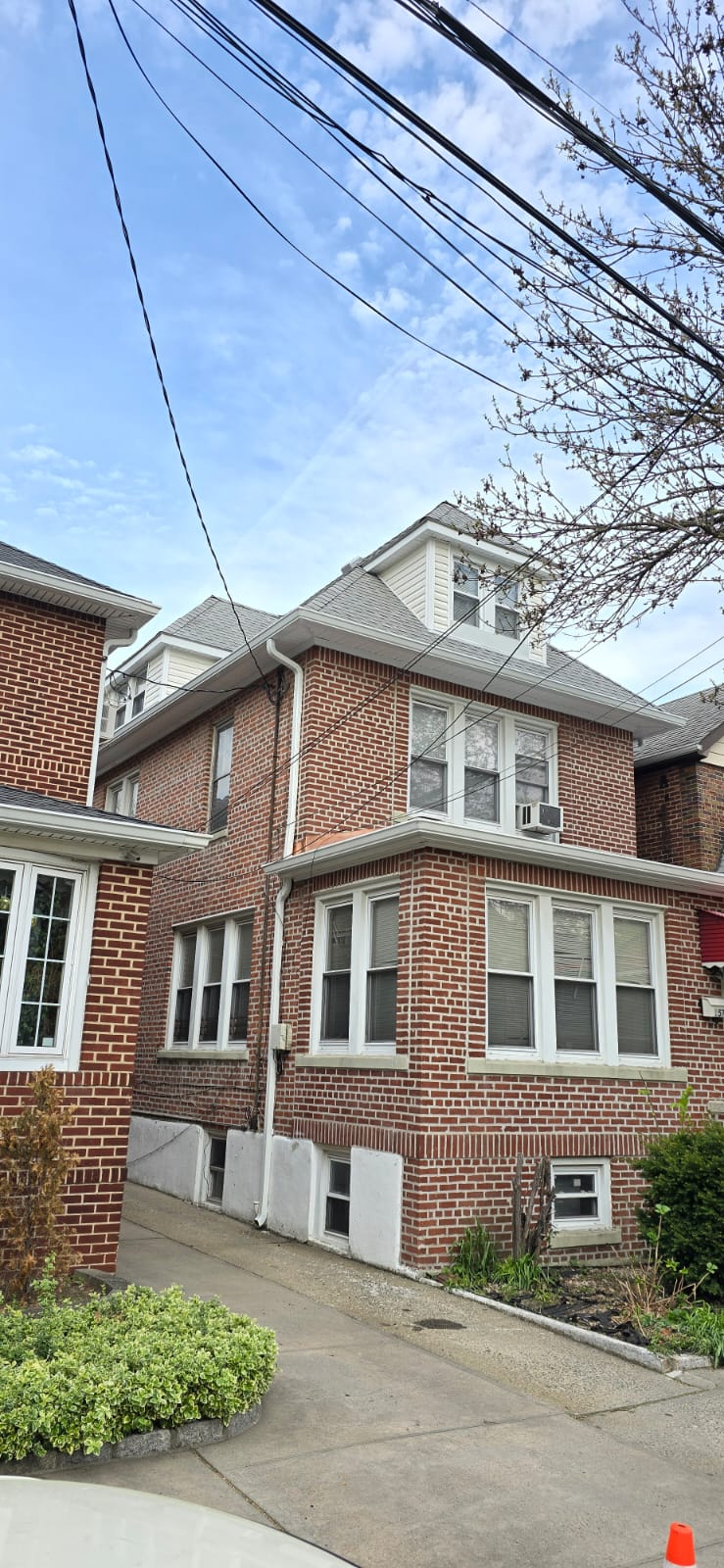 New Shingle Roof, Gutter, Siding and Soffit in Bronx Project Shot 6
