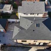 Remove Spanish Tile Roof, Install Shingle Roof, Skylight, Soffit & Gutter in Queens