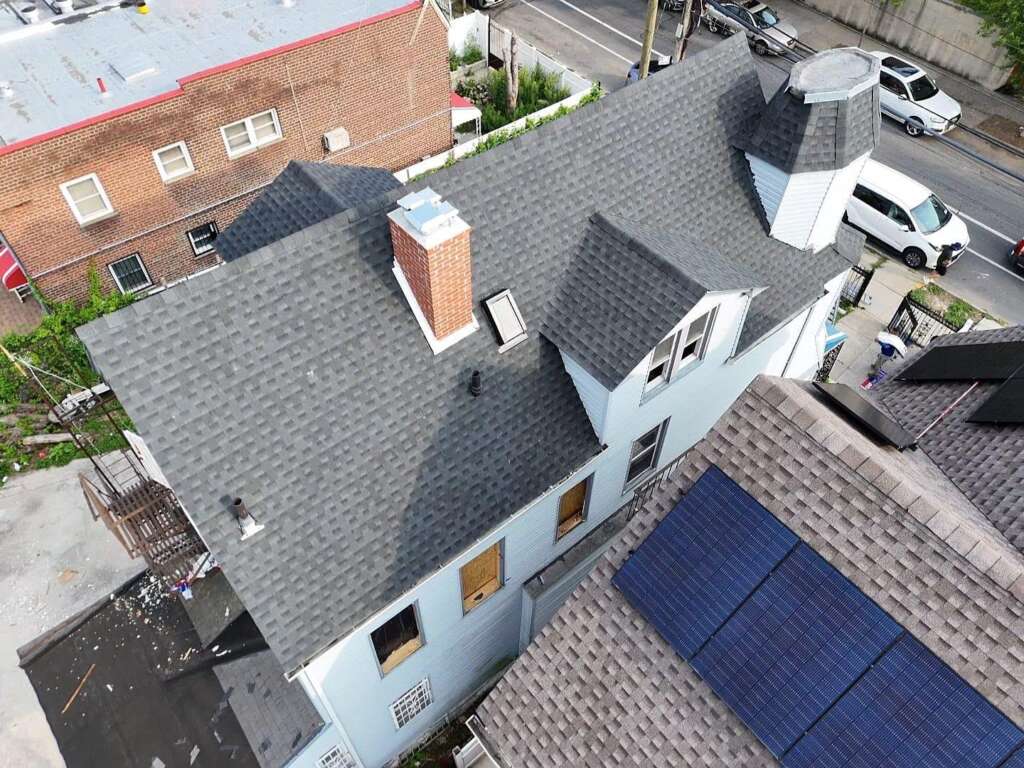 Shingle Roof, Gutter, and Soffit Replacement in Morris Park, Bronx - Detail 1