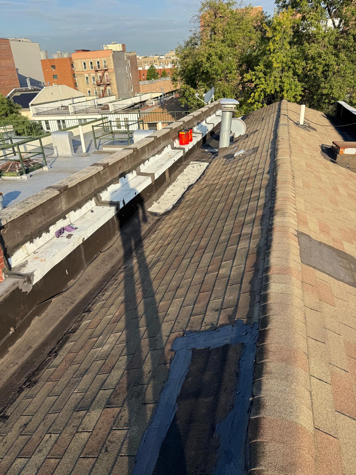 Shingle Roof Replacement & Custom Skylight Flashing Integration in Morris Park, The Bronx, NYC