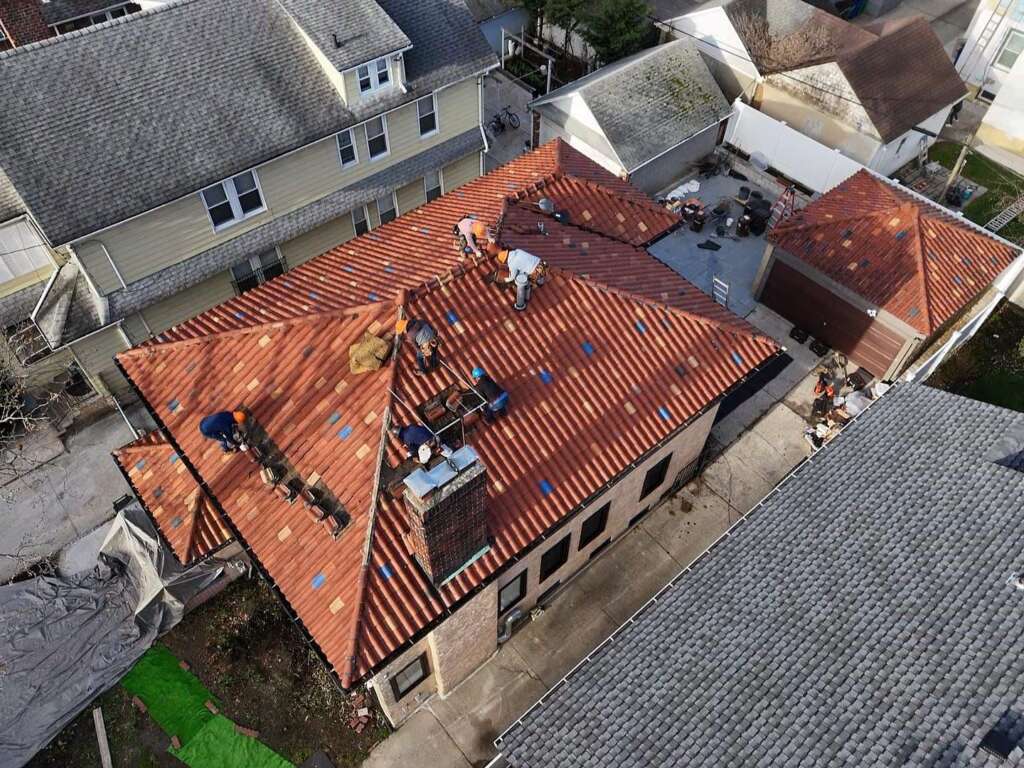 Remove Spanish Tile Roof, Install Shingle Roof, Skylight, Soffit & Gutter in Queens - Detail 3