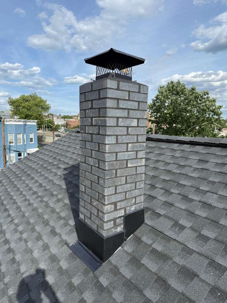 Shingle Roof Replacement, Gutter Installation & Chimney Rebuild in the Bronx, NY - Detail 1
