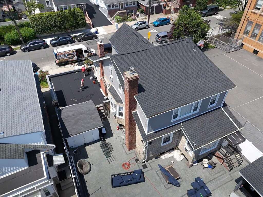 Flat Shingle Roof, Siding & Gutter Replacement in Bronx Project Shot 2
