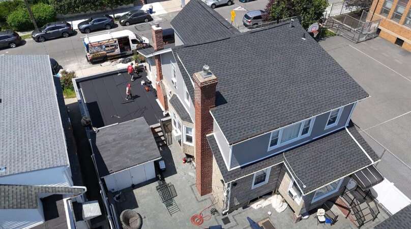 Flat Shingle Roof, Siding & Gutter Replacement in Bronx Project Shot 2