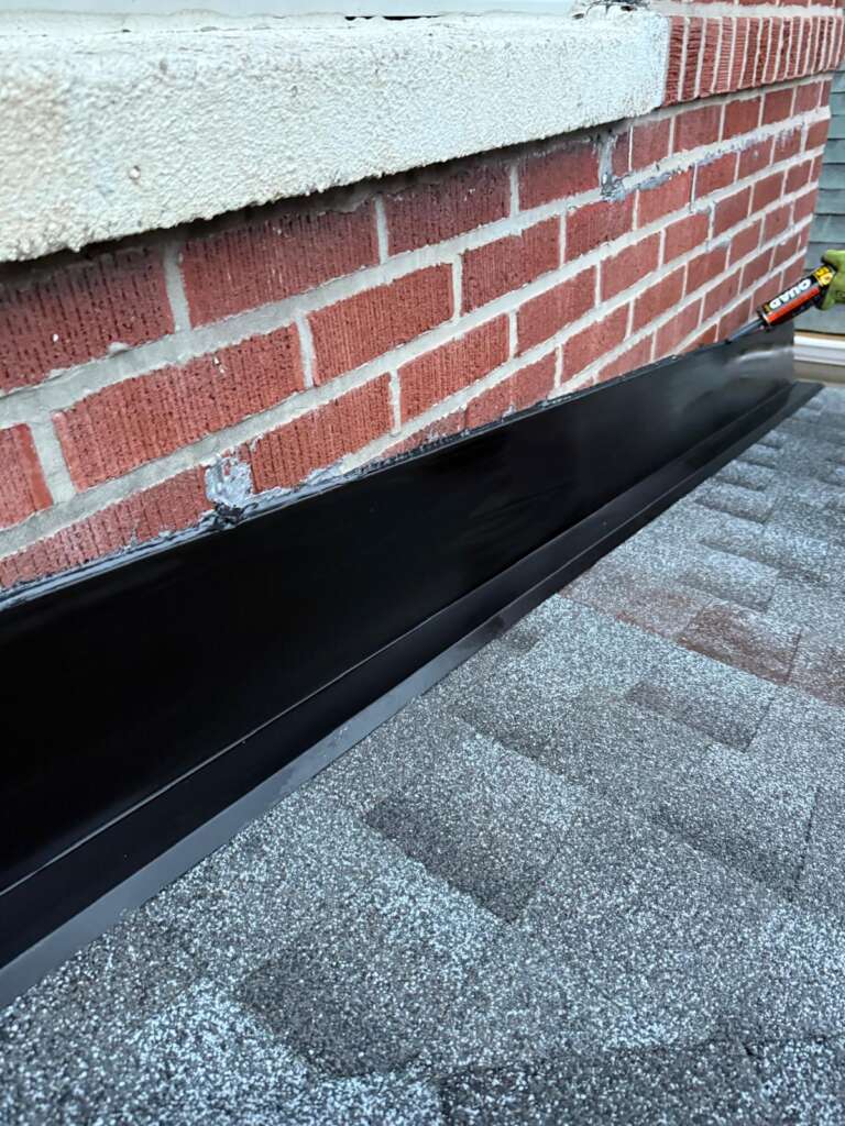 Shingle roof installation in progress in Throgs Neck, Bronx. Roofing team removing old shingles, preparing roof deck, and installing underlayment for durable and long-lasting results.