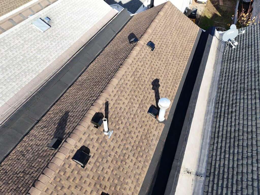 Completed new shingle roof installation in Throgs Neck, Bronx. High-quality shingle roofing system installed by Home Team Construction for maximum durability and protection.