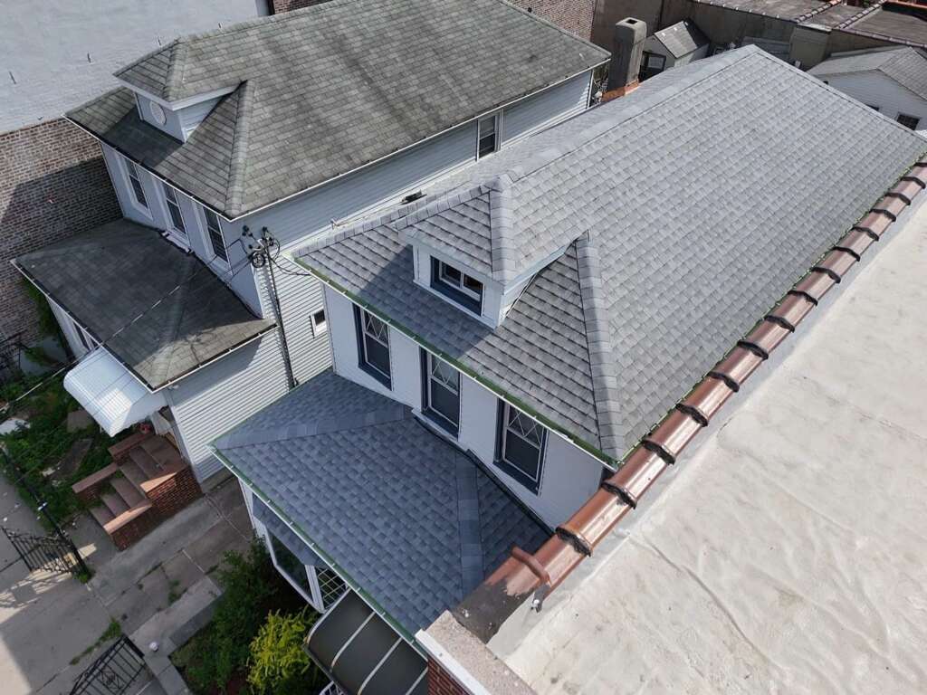 Shingle Roof, Gutter, and Soffit Replacement in Morris Park, Bronx - Detail 3