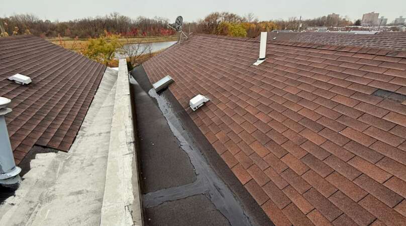 Shingle roof installation in progress at Castle Hill, Bronx (ZIP 10473). Roofing team removing old shingles, preparing roof deck, installing underlayment and ventilation for durable and long-lasting results