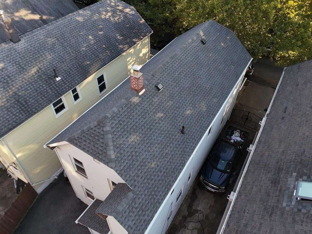 Shingle & Gutter Replacement and Chimney & Flashing Installation Project Shot 7