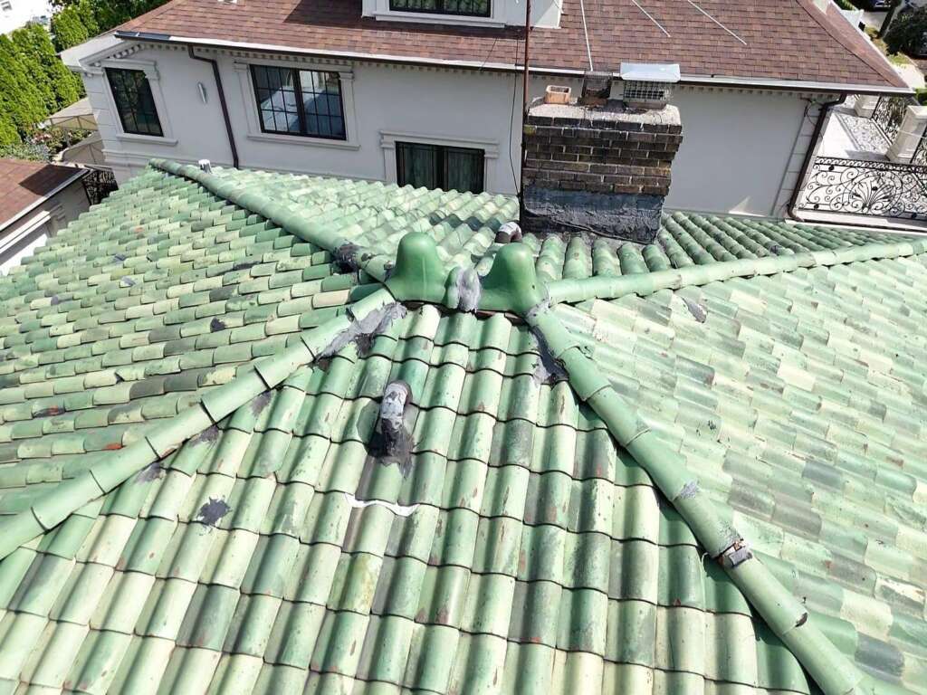 Spanish Tile Roof Replaced with New Shingle & Gutter Installation in Queens Project Shot 11