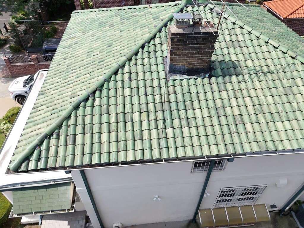 Spanish Tile Roof Replaced with New Shingle & Gutter Installation in Queens Project Shot 12