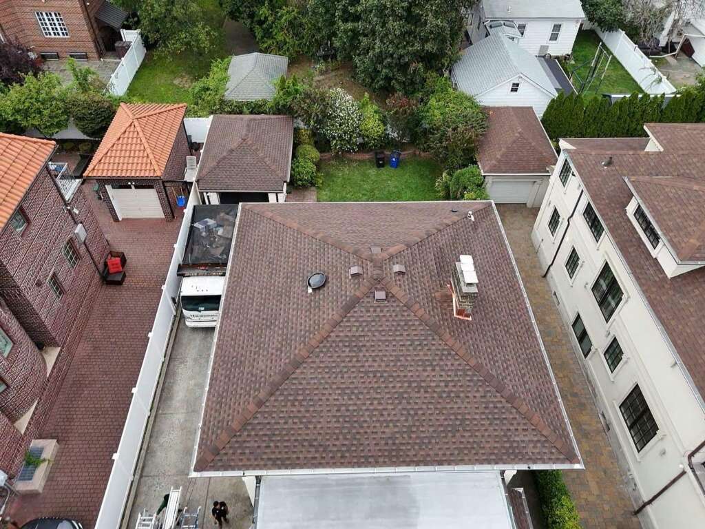 Spanish Tile Roof Replaced with New Shingle & Gutter Installation in Queens Project Shot 13