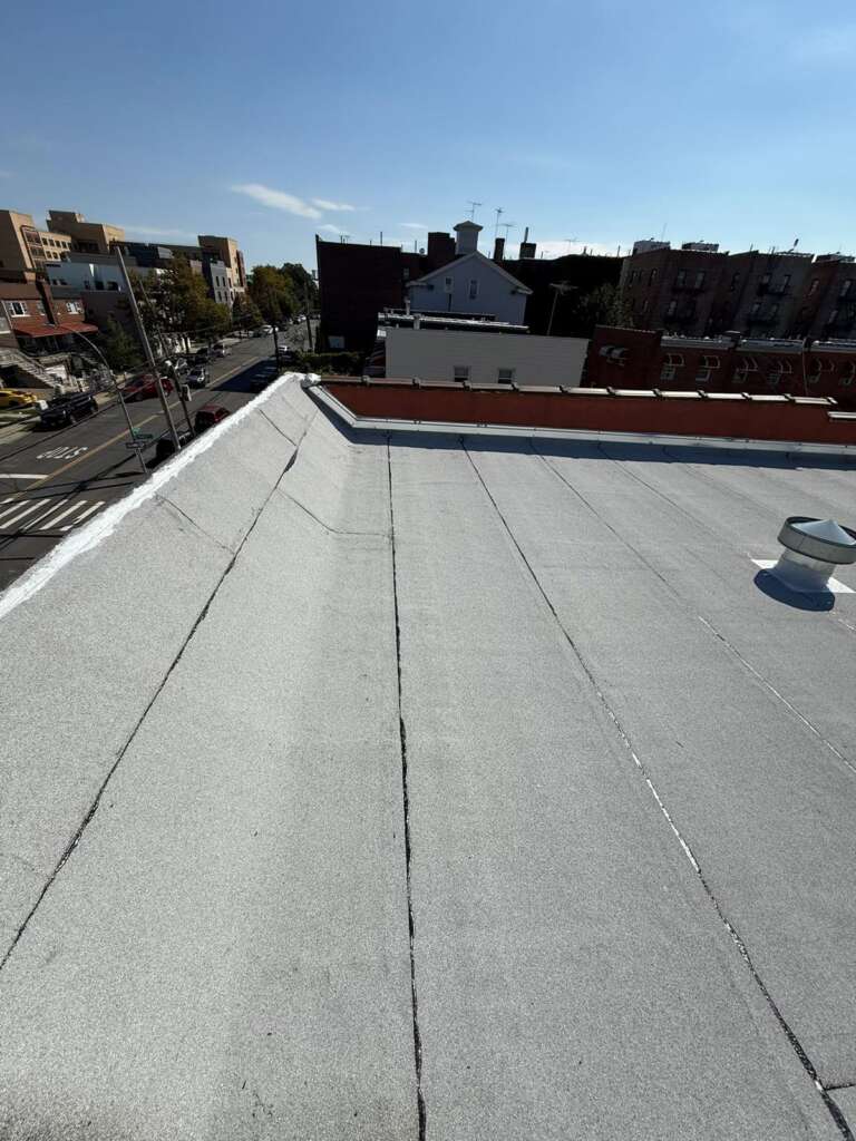 Spanish Tile Roof Replaced with New Shingle & Gutter Installation in Queens Project Shot 2