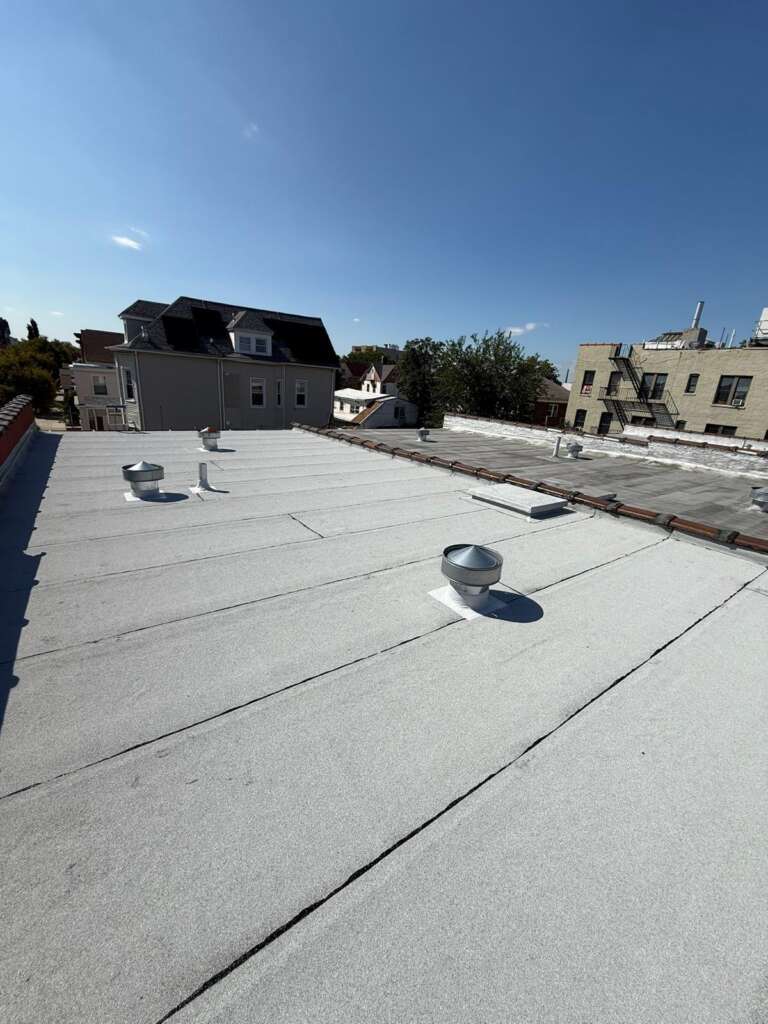 Spanish Tile Roof Replaced with New Shingle & Gutter Installation in Queens Project Shot 5