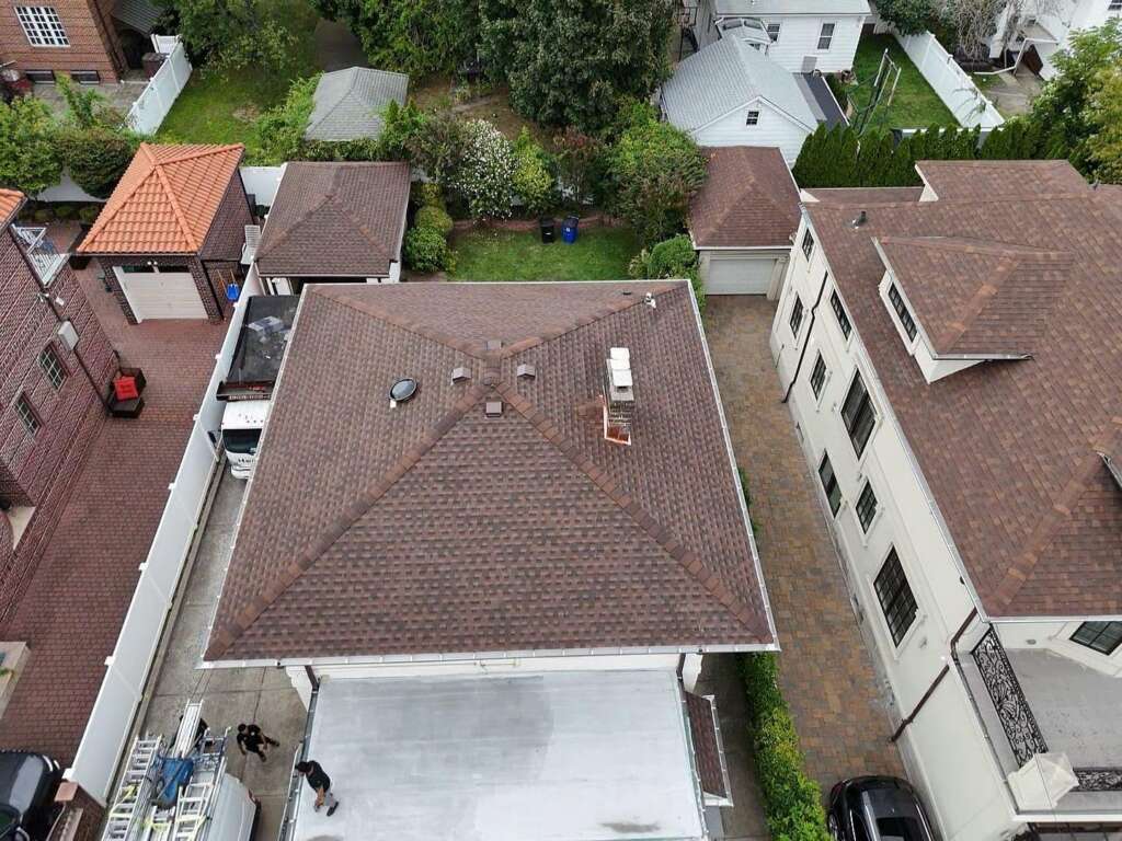 Spanish Tile Roof Replaced with New Shingle & Gutter Installation in Queens Project Shot 9